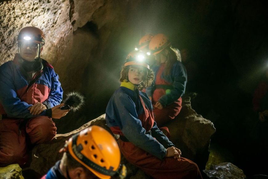 people in a cave